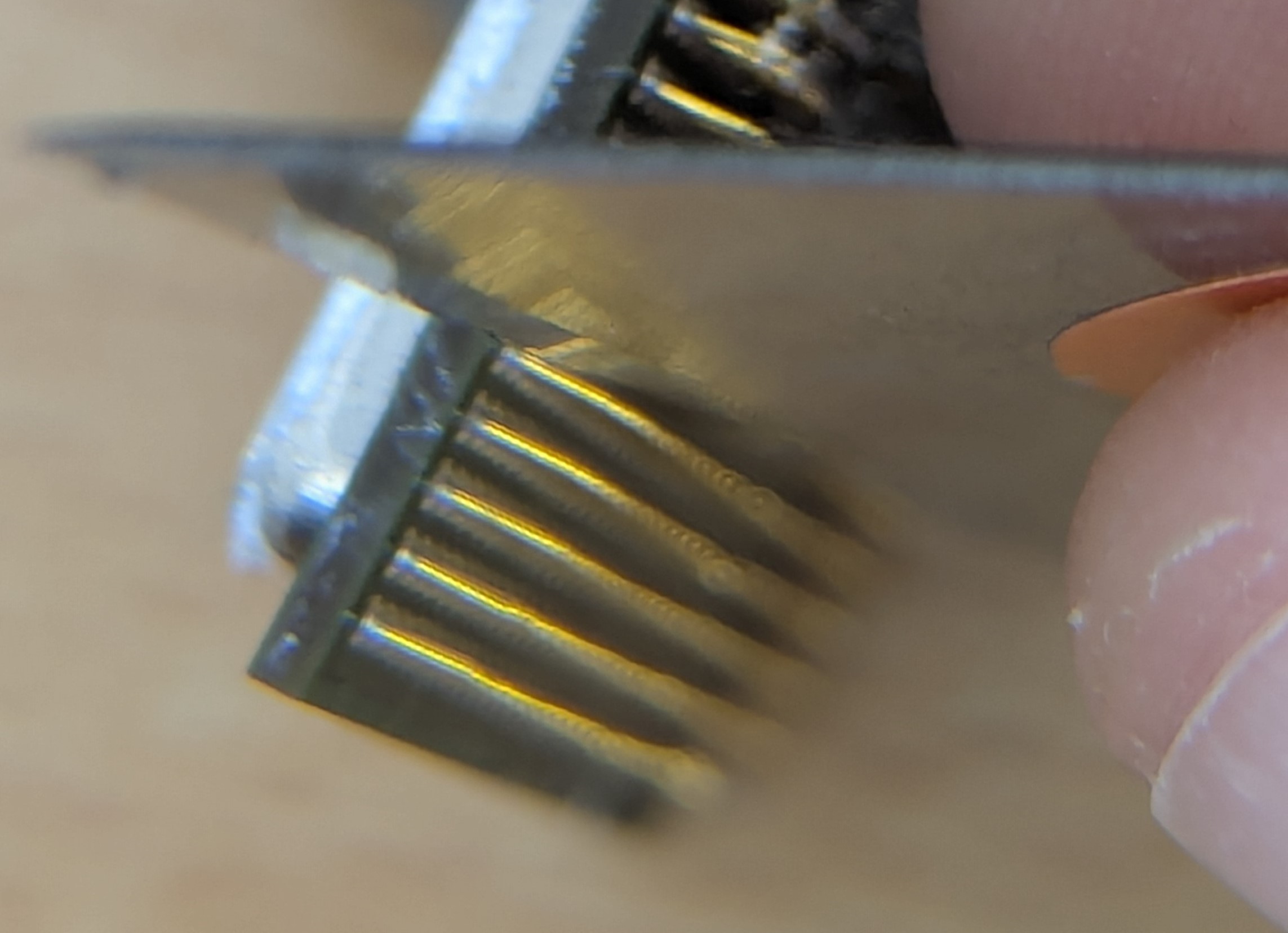 CPU with blade against pins